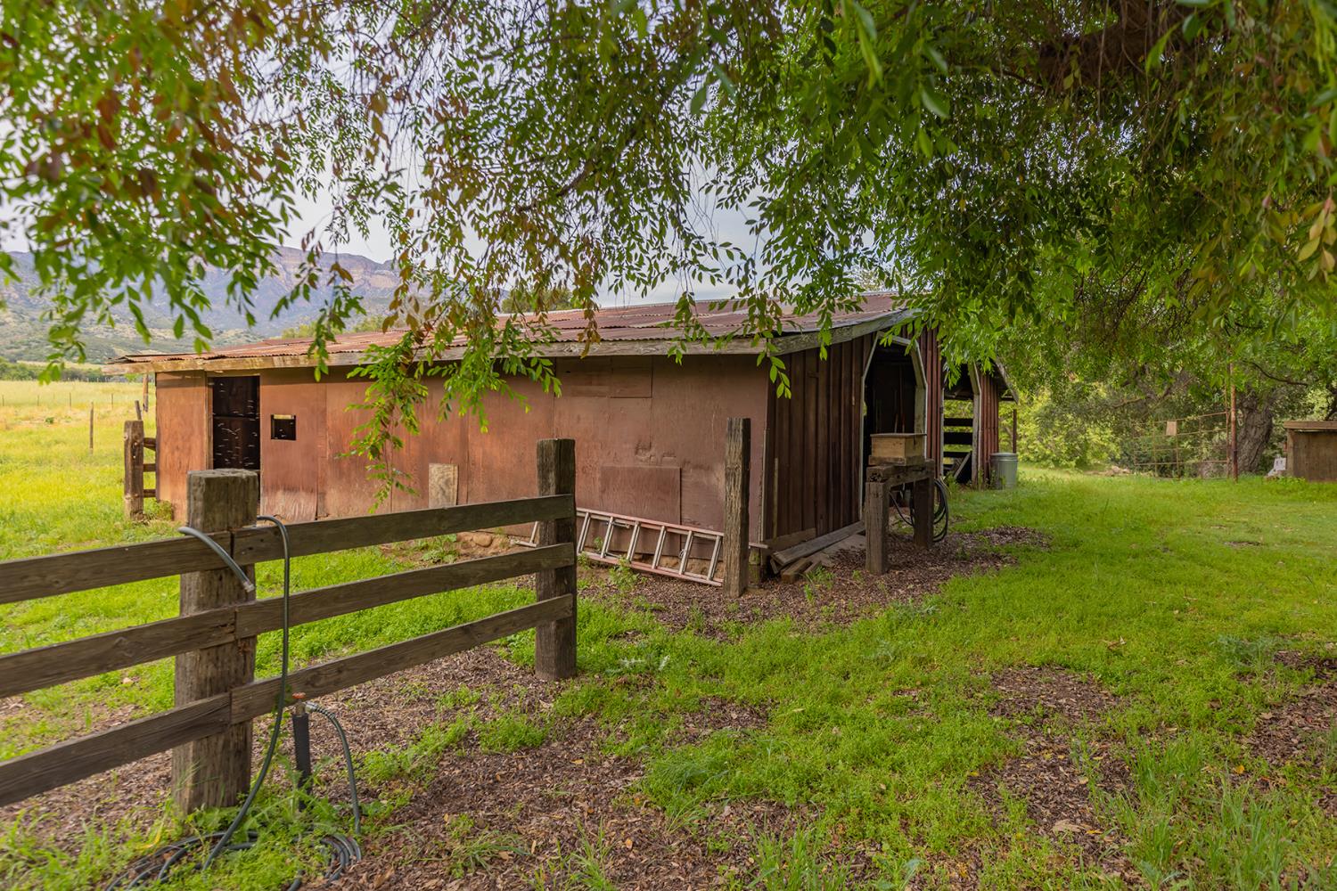 11954 Sulphur Mountain Road Ojai, CA 93023 - Photo 10 of 41 a view of a house with a yard