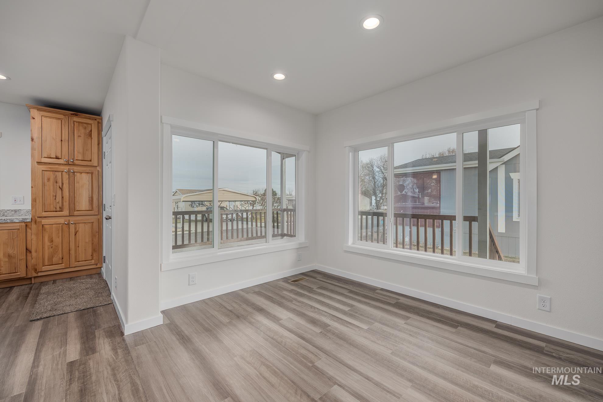 2750 Alden Road, Unit 8 Fruitland, ID 83619 - Photo 10 of 31 Empty room with light wood-type flooring and recessed lighting