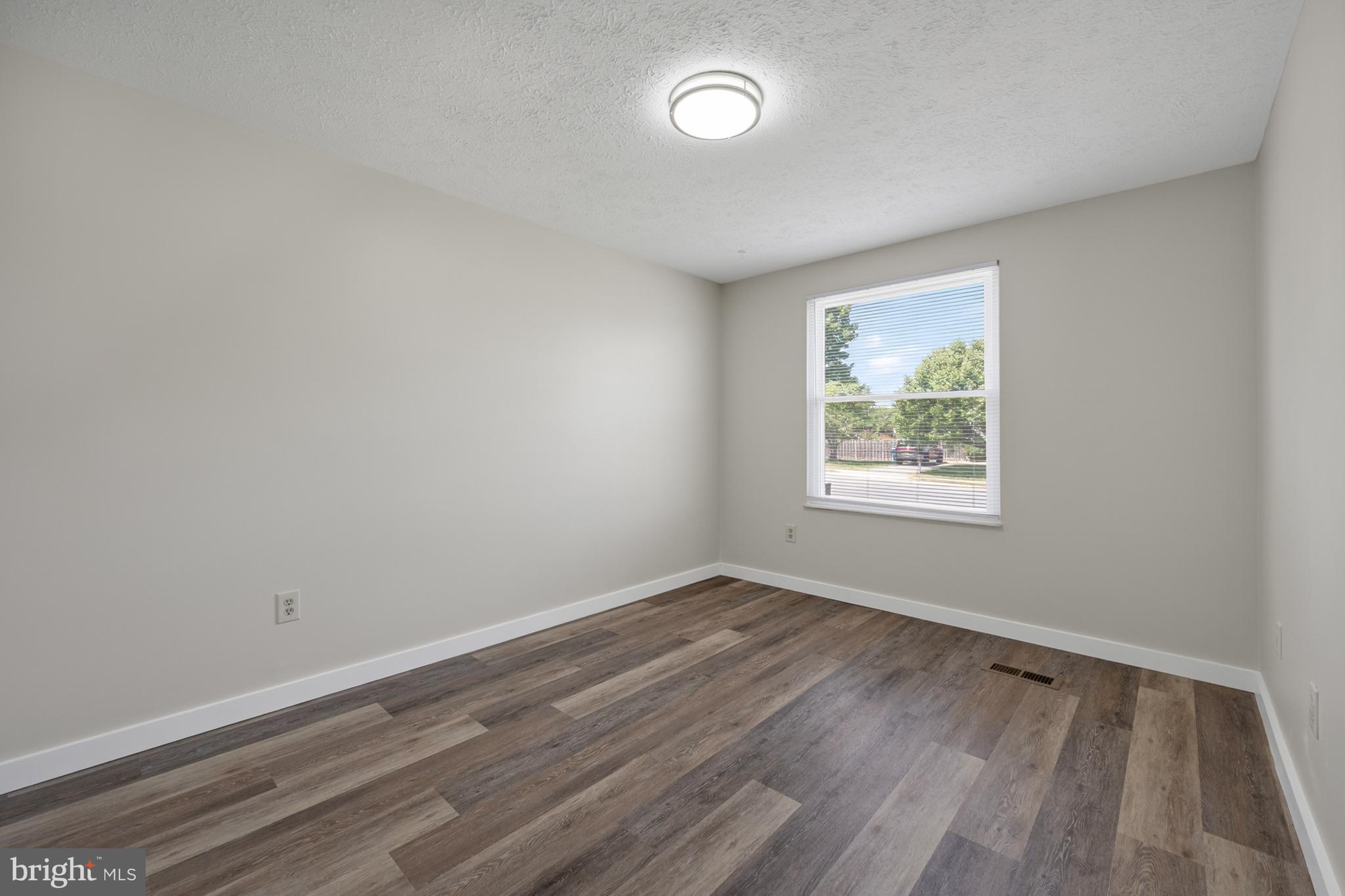 4429 Cub Run Road Chantilly, VA 20151 - Photo 20 of 56 an empty room with a window