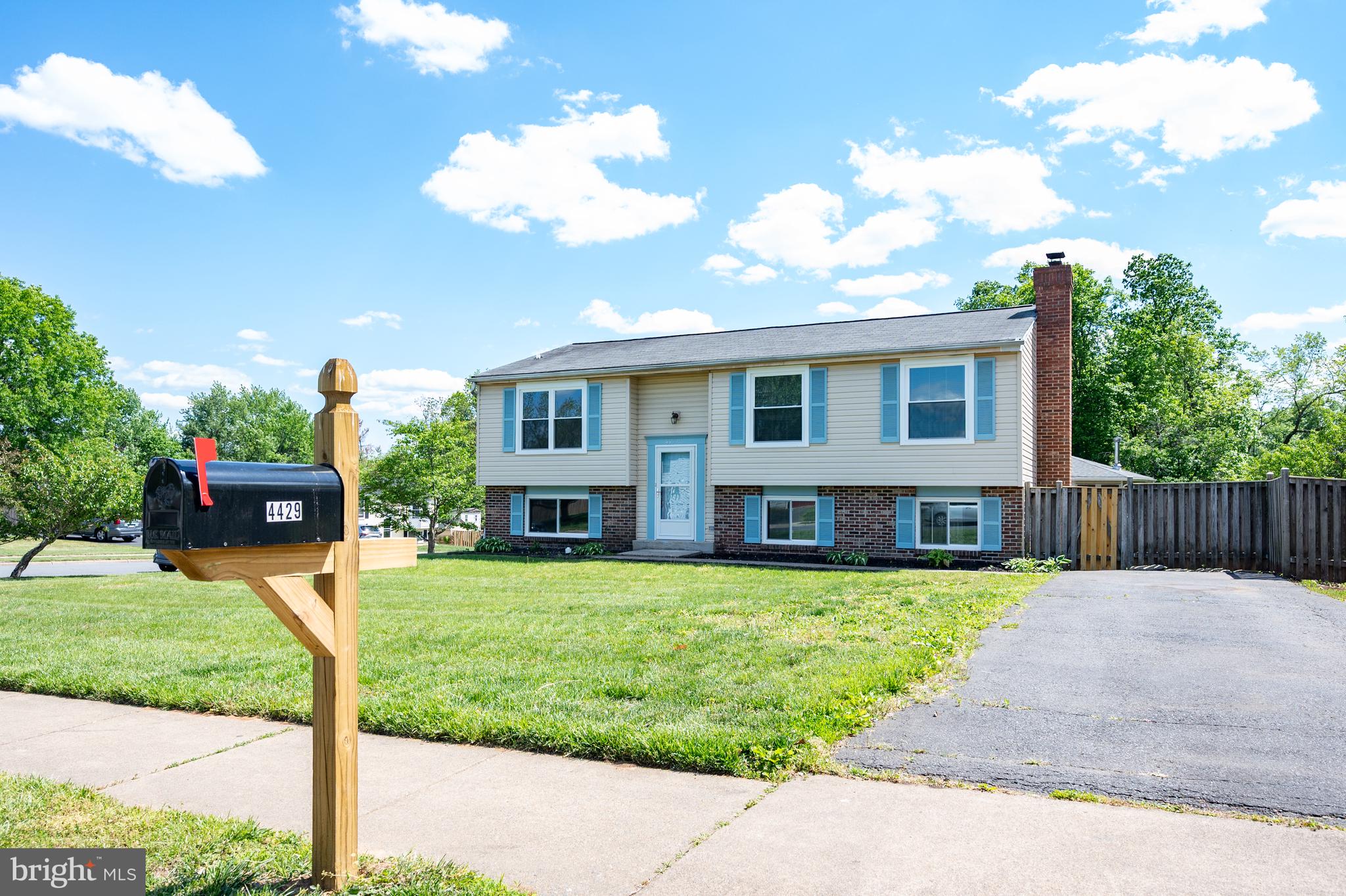 4429 Cub Run Road Chantilly, VA 20151 - Photo 2 of 56 a view of a house with a yard porch and sitting area