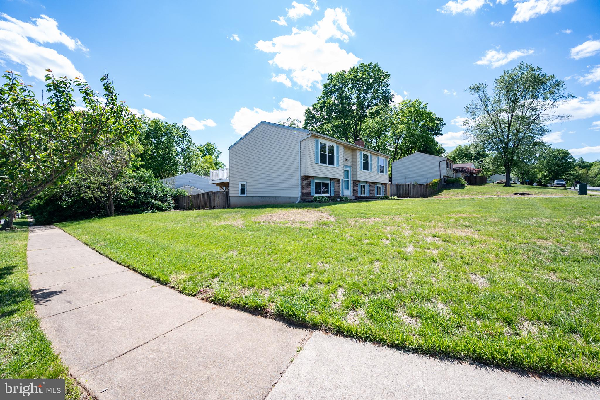 4429 Cub Run Road Chantilly, VA 20151 - Photo 3 of 56 a house that has a big yard and large trees