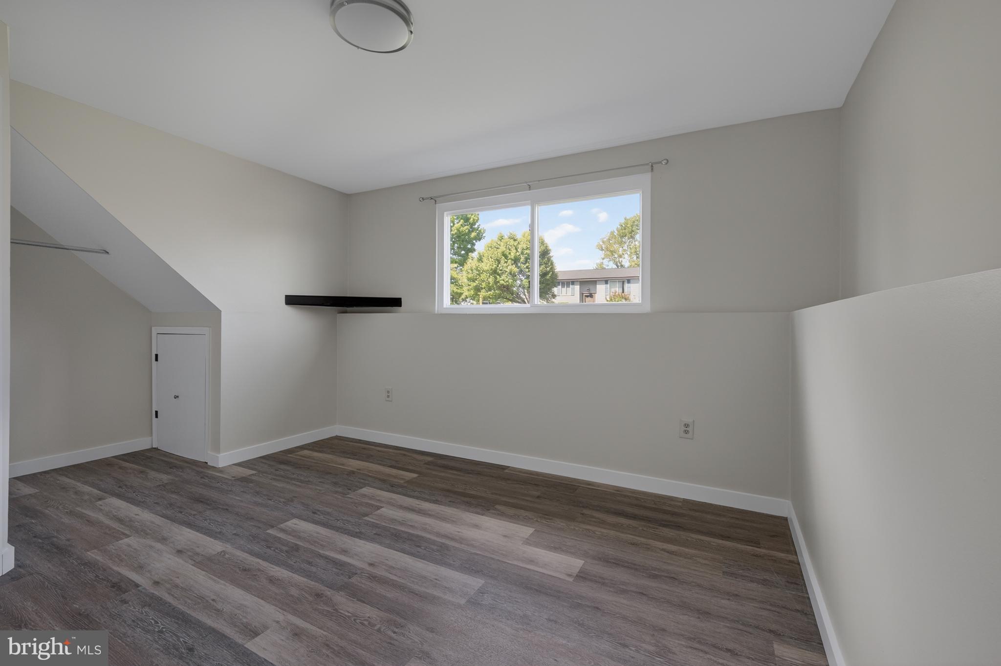 4429 Cub Run Road Chantilly, VA 20151 - Photo 36 of 56 a view of room with window and wooden floor