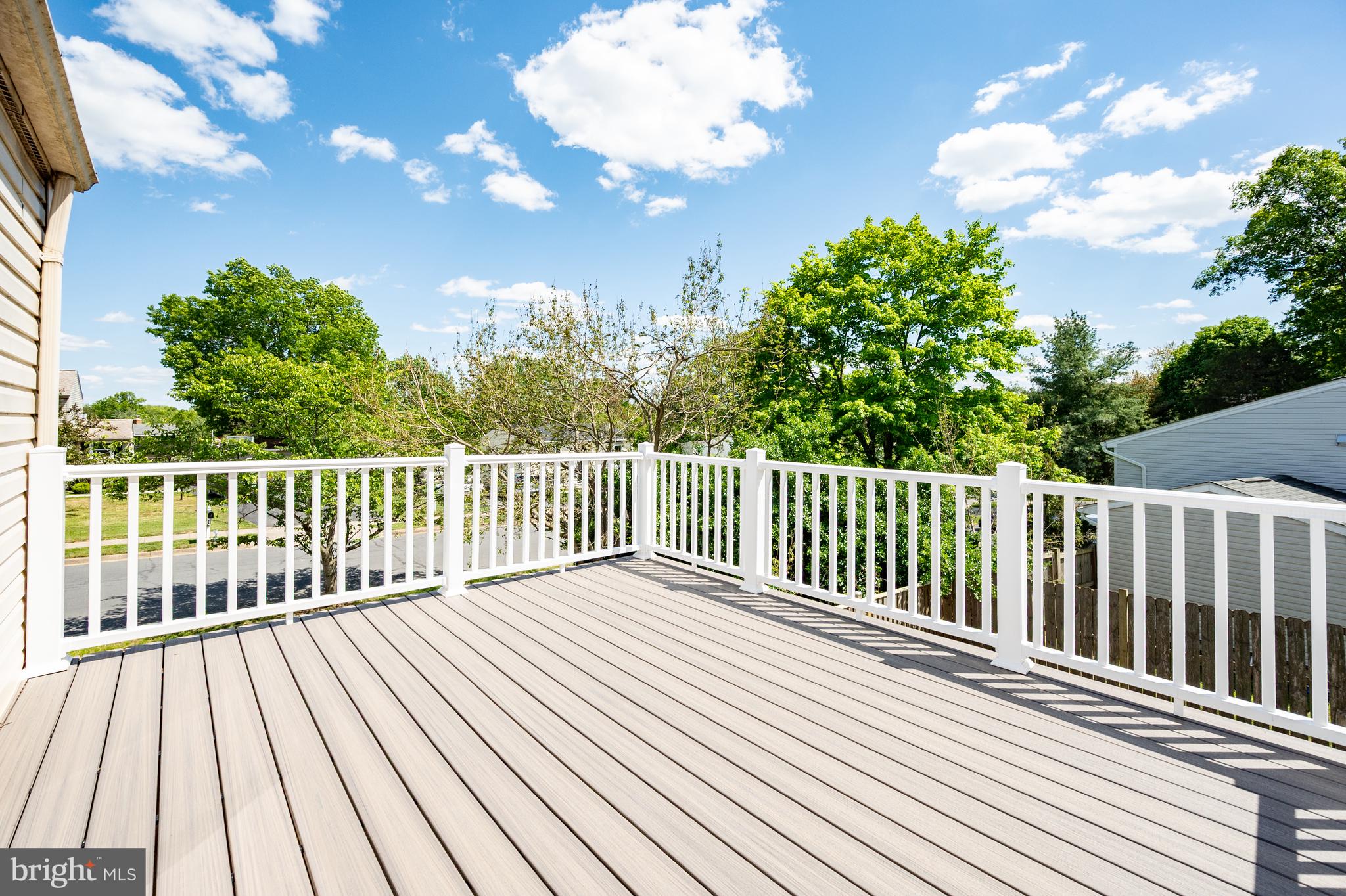 4429 Cub Run Road Chantilly, VA 20151 - Photo 41 of 56 a view of a wooden roof with a tree
