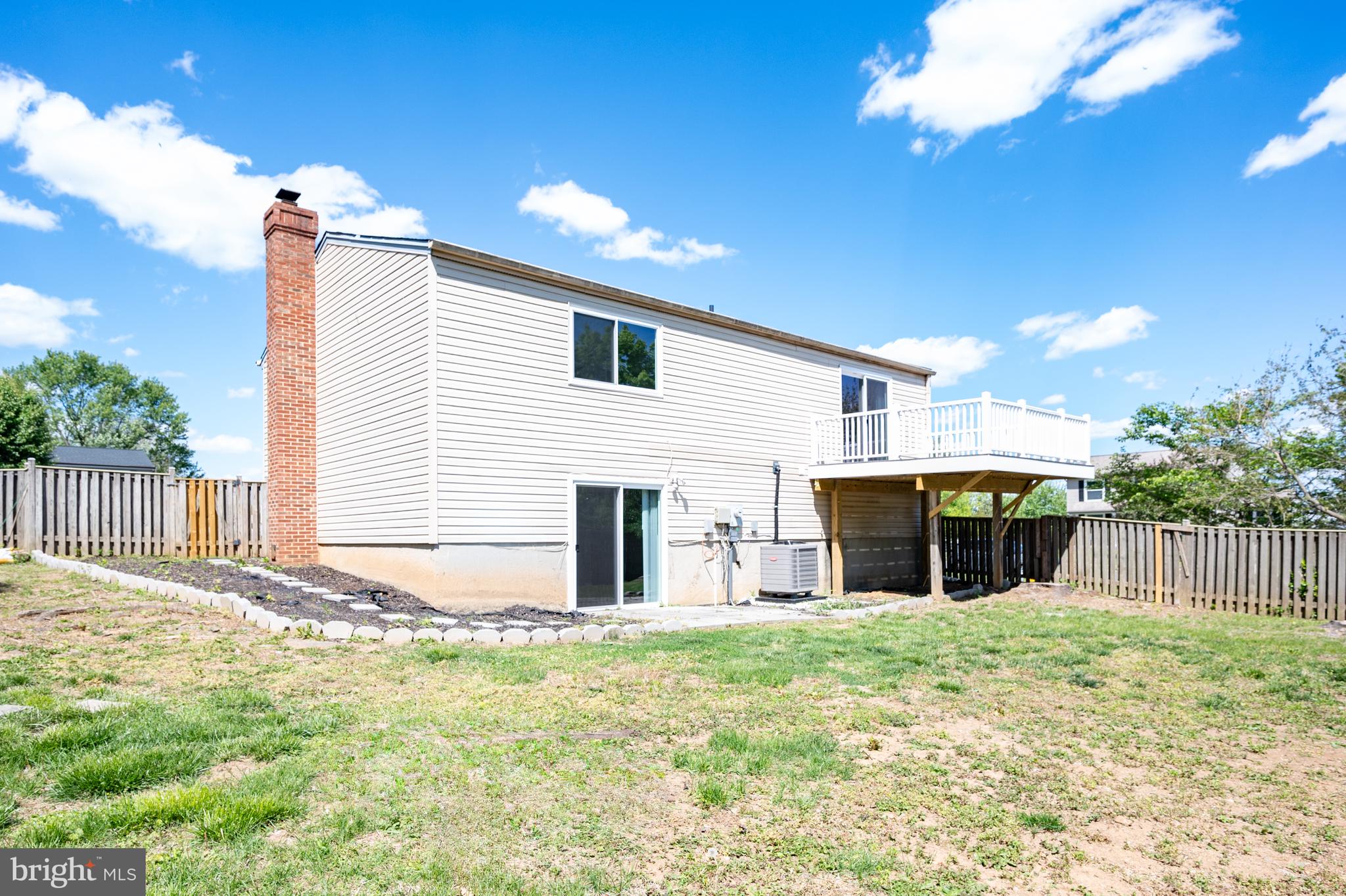 4429 Cub Run Road Chantilly, VA 20151 - Photo 45 of 56 a view of a house with a yard and sitting area