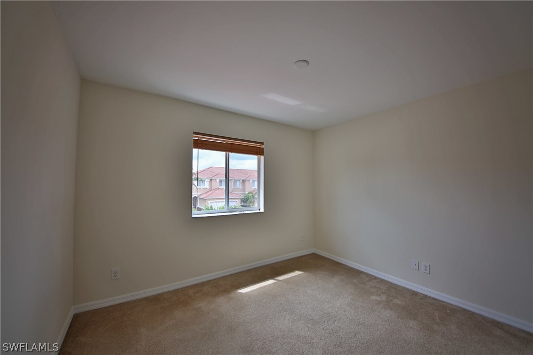 17521 Cherry Ridge Lane Fort Myers, FL 33967 - Photo 17 of 23 an empty room with windows