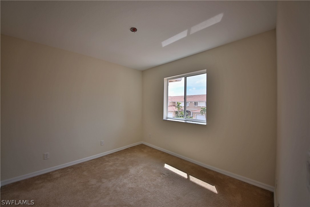 17521 Cherry Ridge Lane Fort Myers, FL 33967 - Photo 18 of 23 an empty room with windows