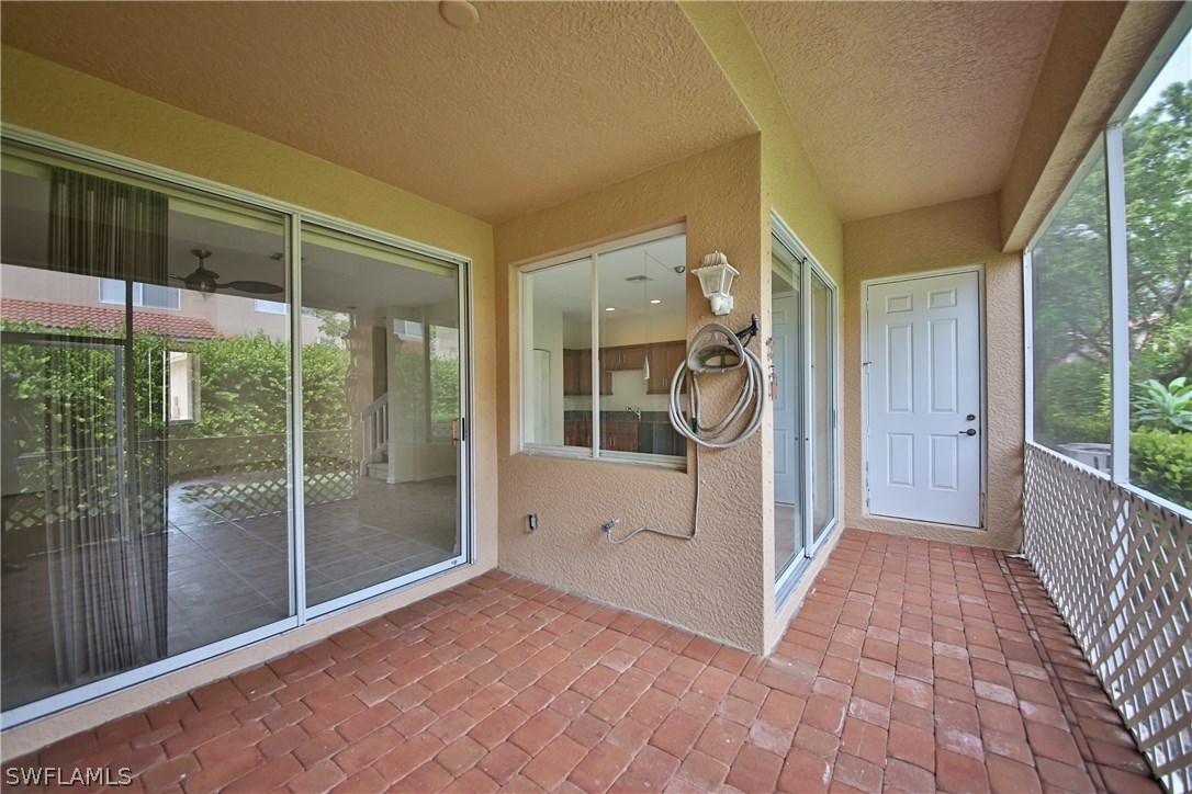17521 Cherry Ridge Lane Fort Myers, FL 33967 - Photo 21 of 23 a view of a hallway with windows