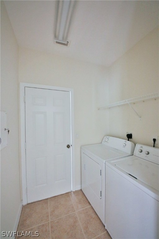 17521 Cherry Ridge Lane Fort Myers, FL 33967 - Photo 10 of 23 a utility room with dryer and washer