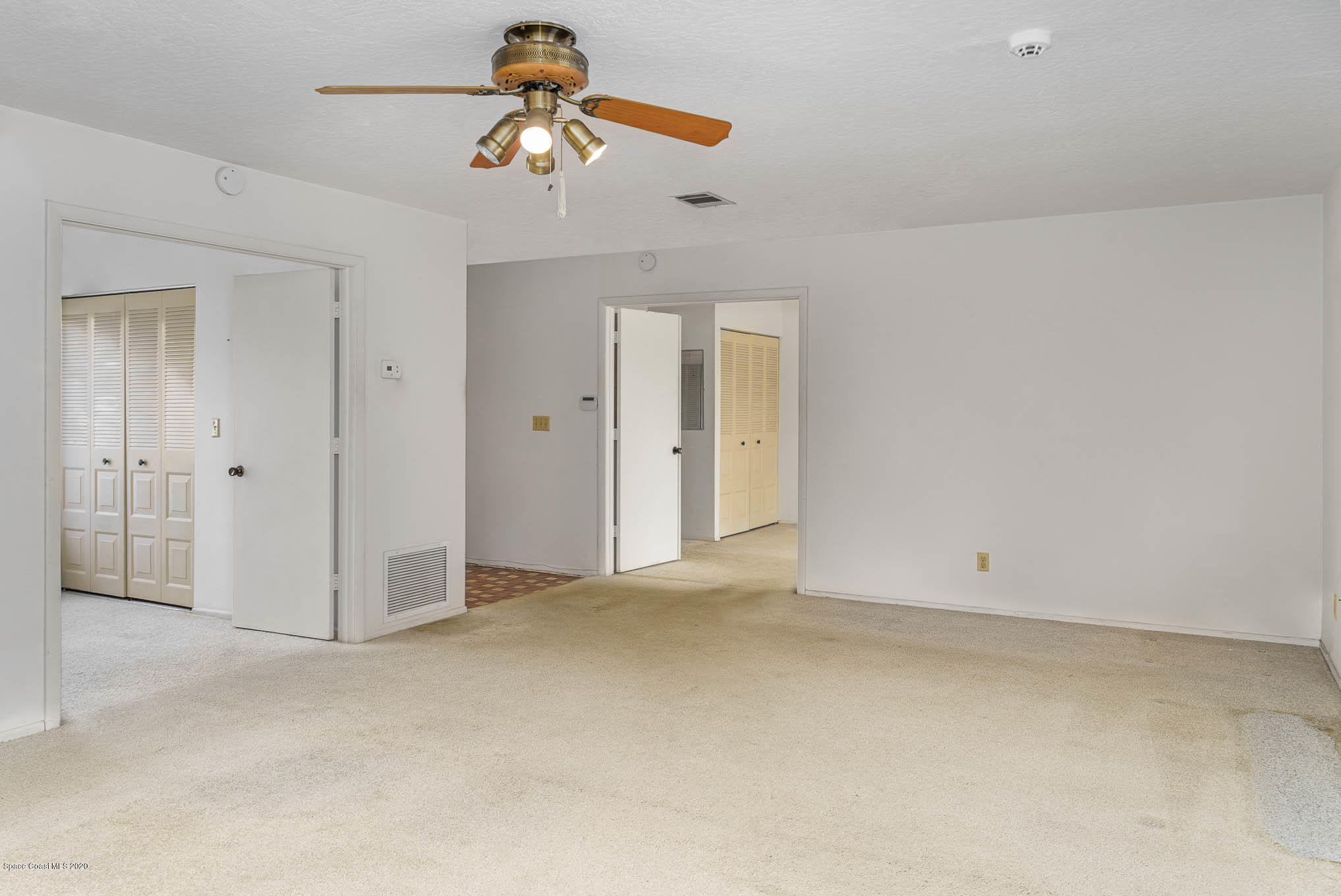 1378 Cromey Road Northeast Palm Bay, FL 32905 - Photo 9 of 25 Spacious Living Room