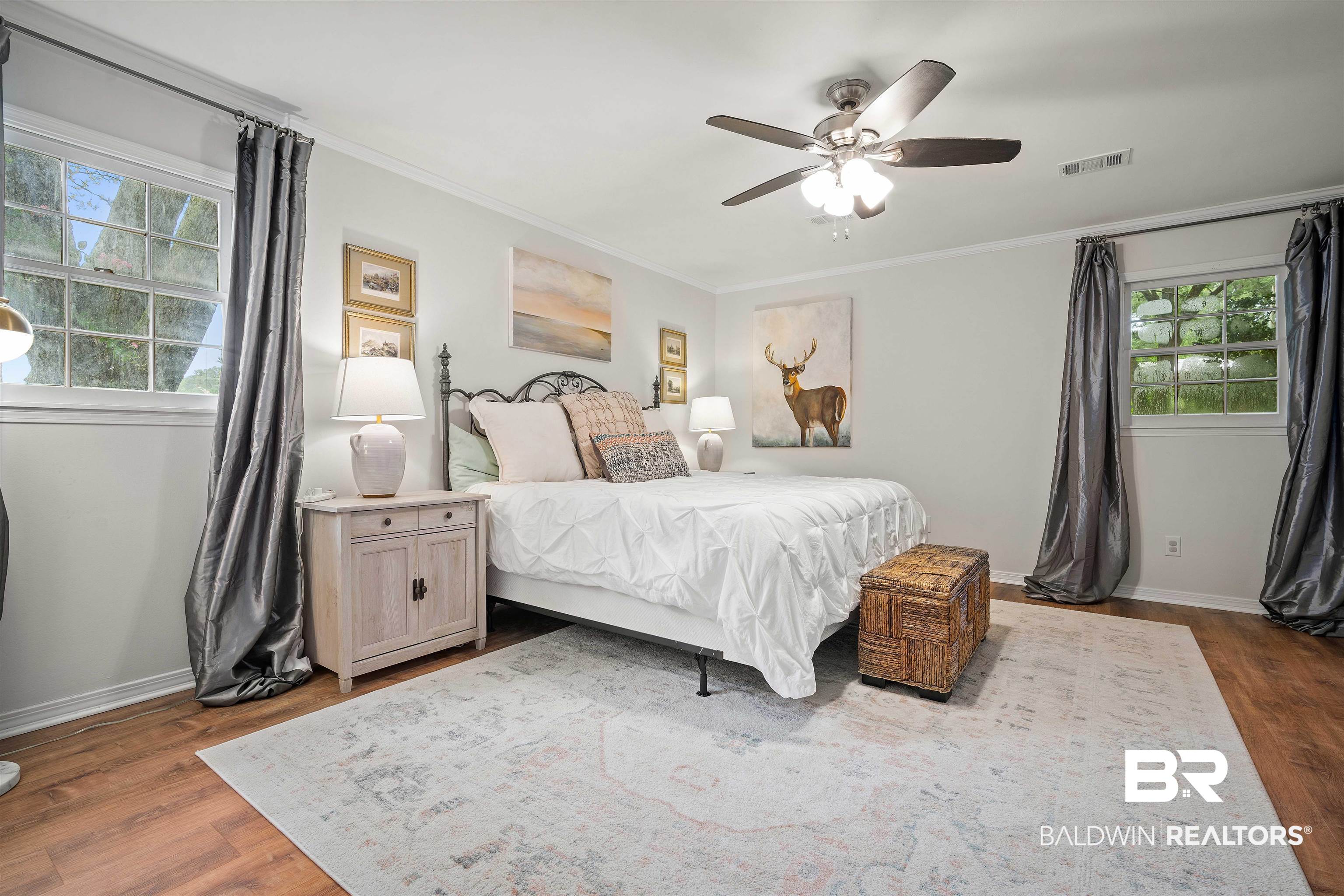 700 Eliza Jordan Road North Mobile, AL 36608 - Photo 19 of 44 Bedroom with dark wood-style floors, ornamental molding, and a ceiling fan