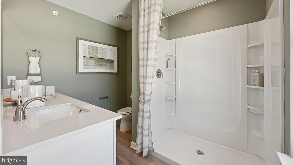 586 Swamp Creek Road Boyertown, PA 19512 - Photo 21 of 26 a bathroom with a sink and a shower