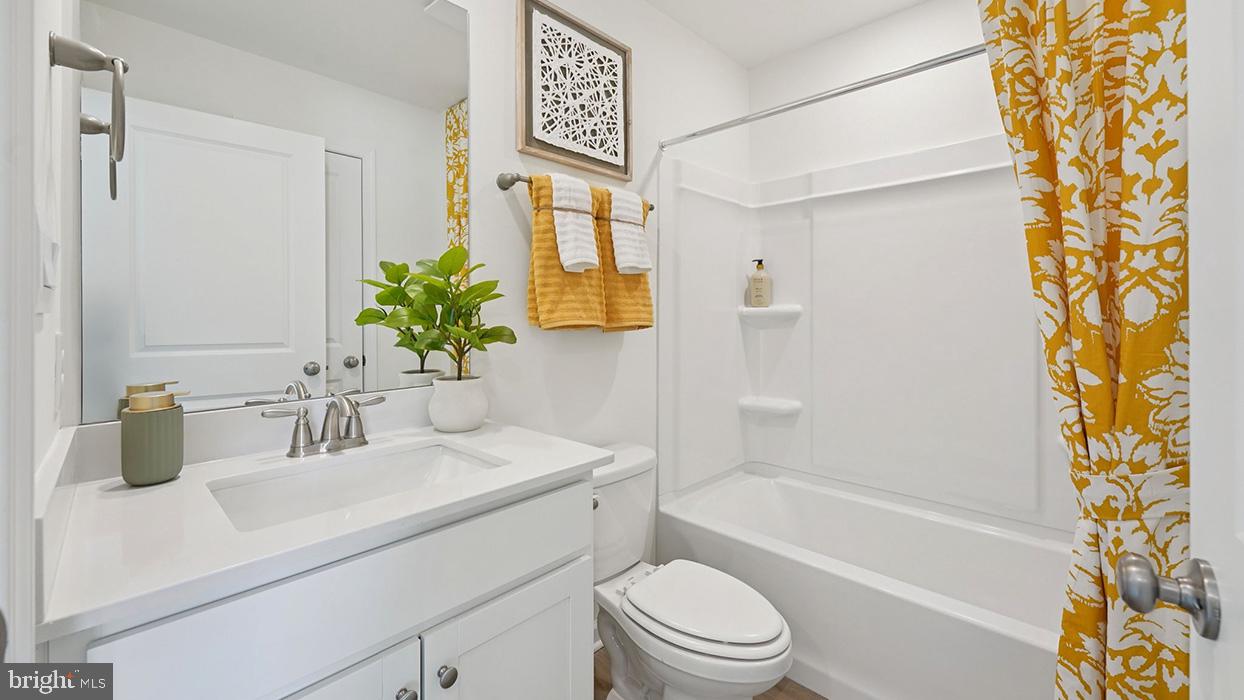 586 Swamp Creek Road Boyertown, PA 19512 - Photo 23 of 26 a bathroom with a sink a toilet and shower