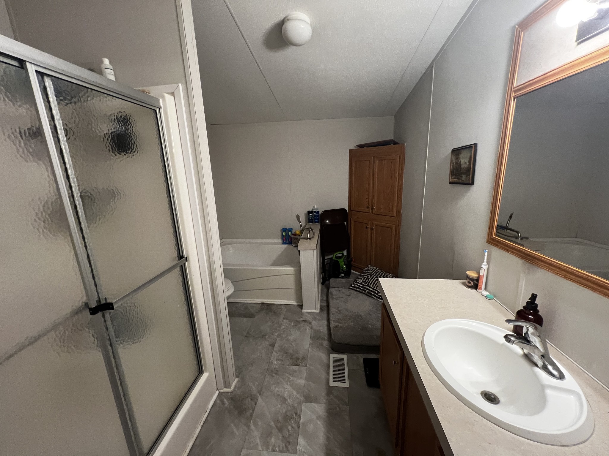 1870 Parker Road Manchester, TN 37355 - Photo 16 of 40 a bathroom with a sink toilet and shower