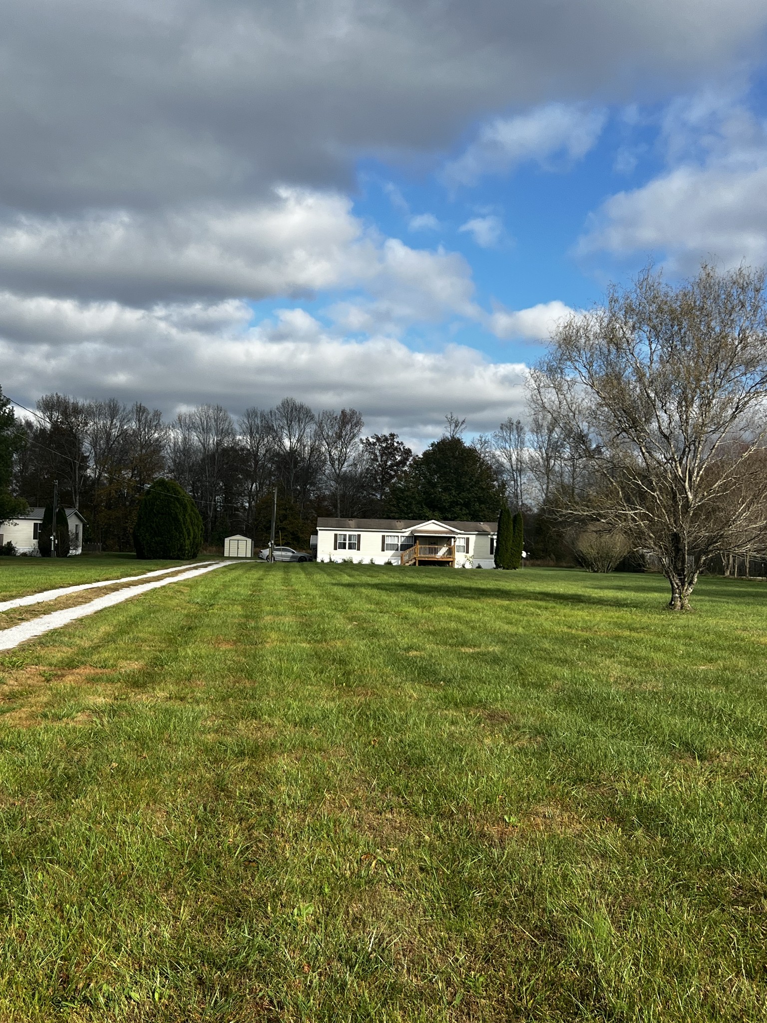 1870 Parker Road Manchester, TN 37355 - Photo 2 of 40 a view of a field of grass and trees