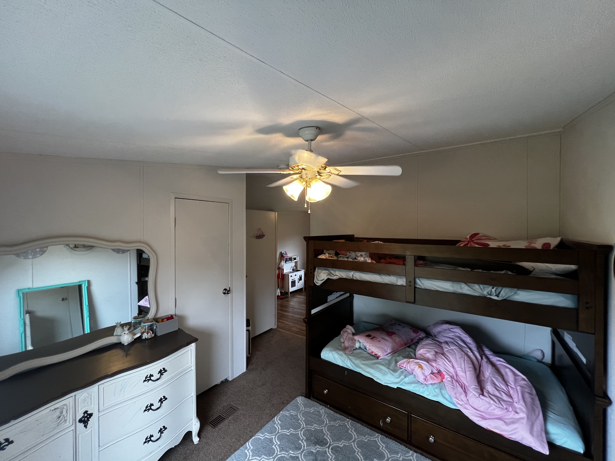 1870 Parker Road Manchester, TN 37355 - Photo 21 of 40 a bedroom with a bed and a dresser