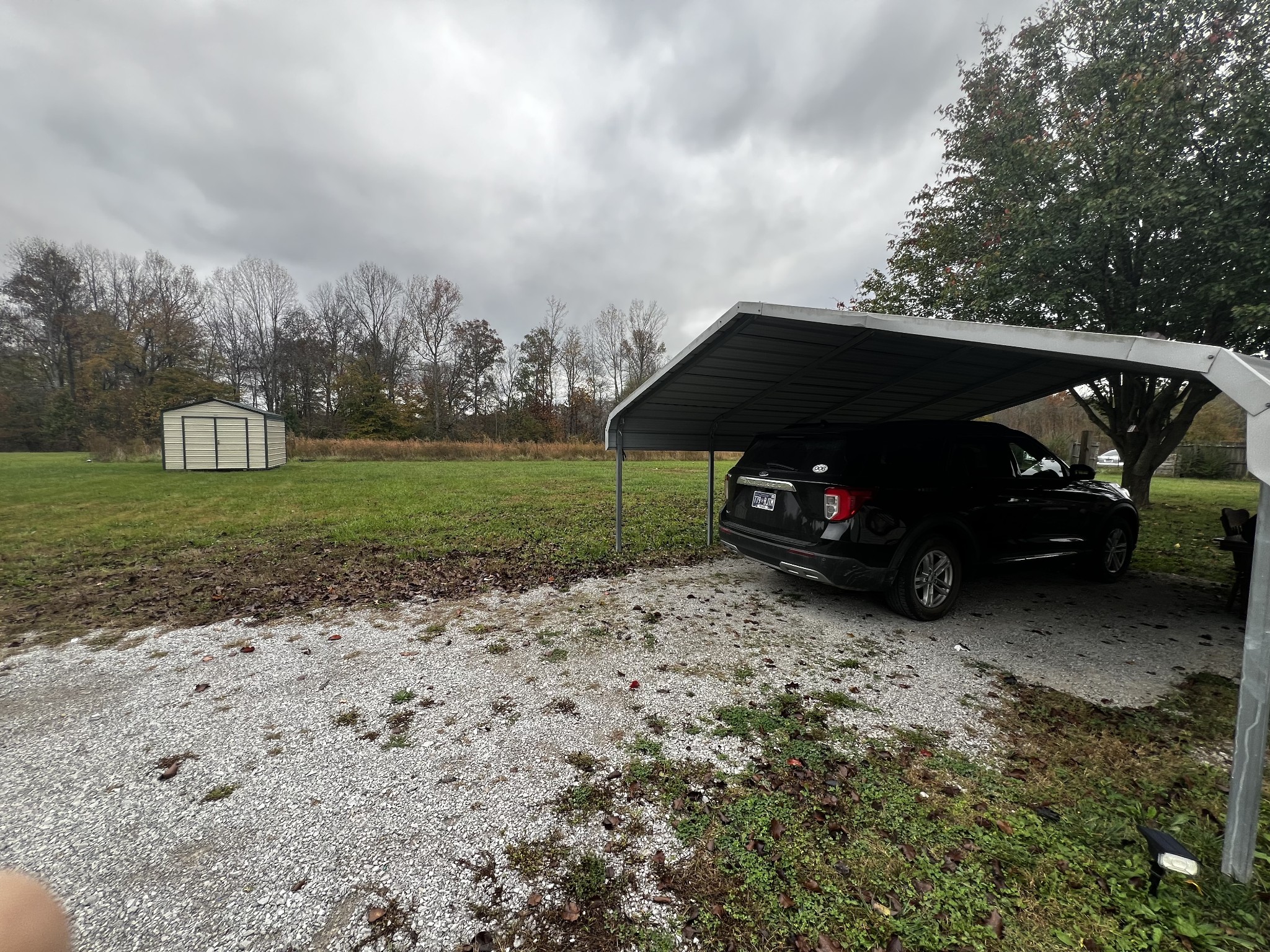 1870 Parker Road Manchester, TN 37355 - Photo 25 of 40 a car parked in front of a house