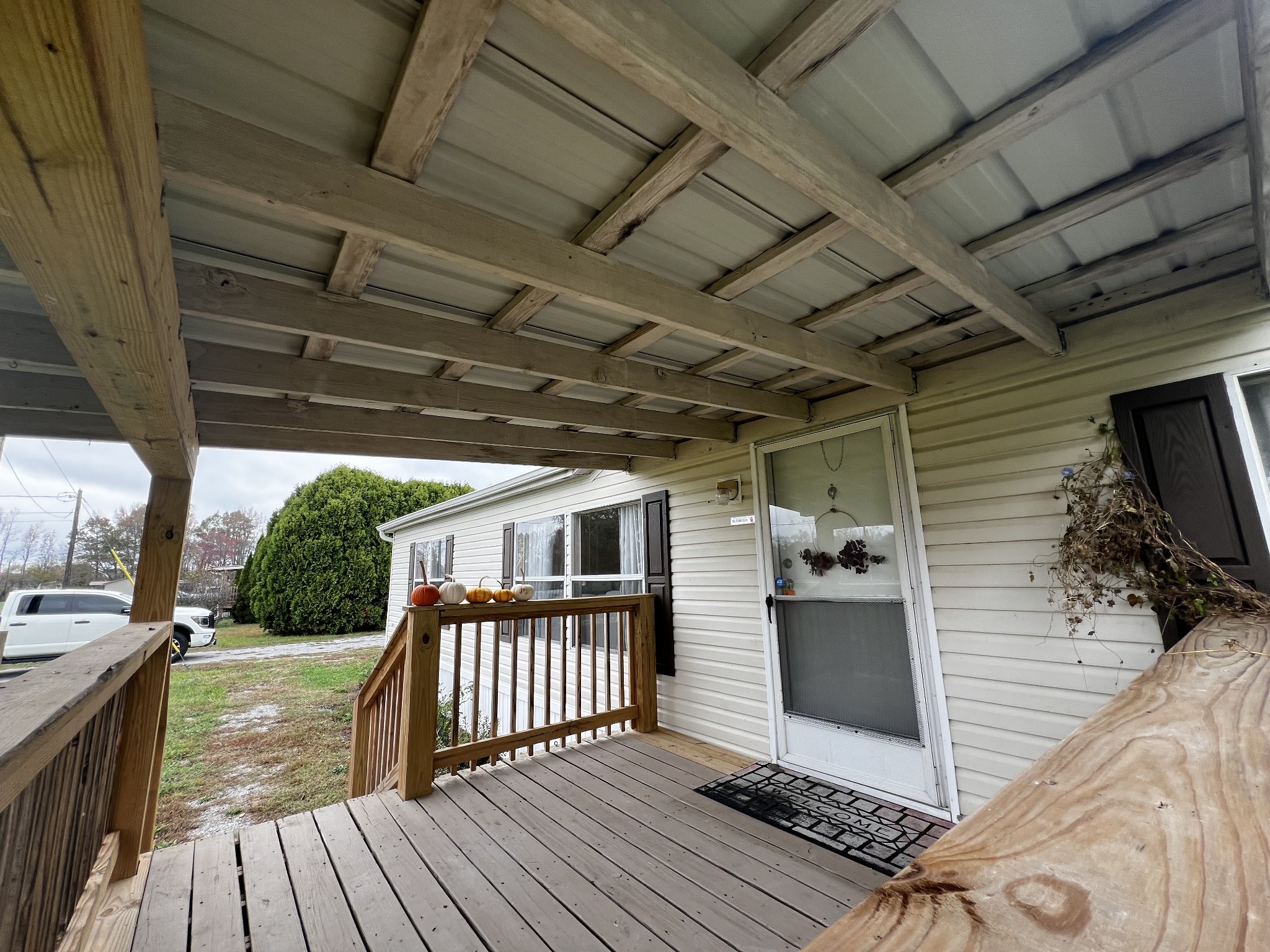 1870 Parker Road Manchester, TN 37355 - Photo 3 of 40 a view of a porch with wooden floor