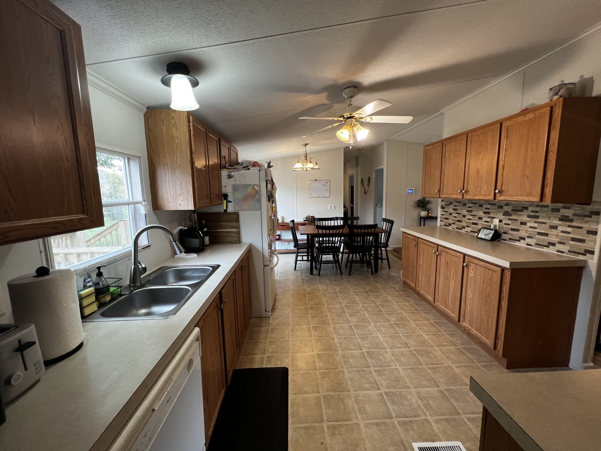 1870 Parker Road Manchester, TN 37355 - Photo 6 of 40 a kitchen with stainless steel appliances a stove sink and cabinets
