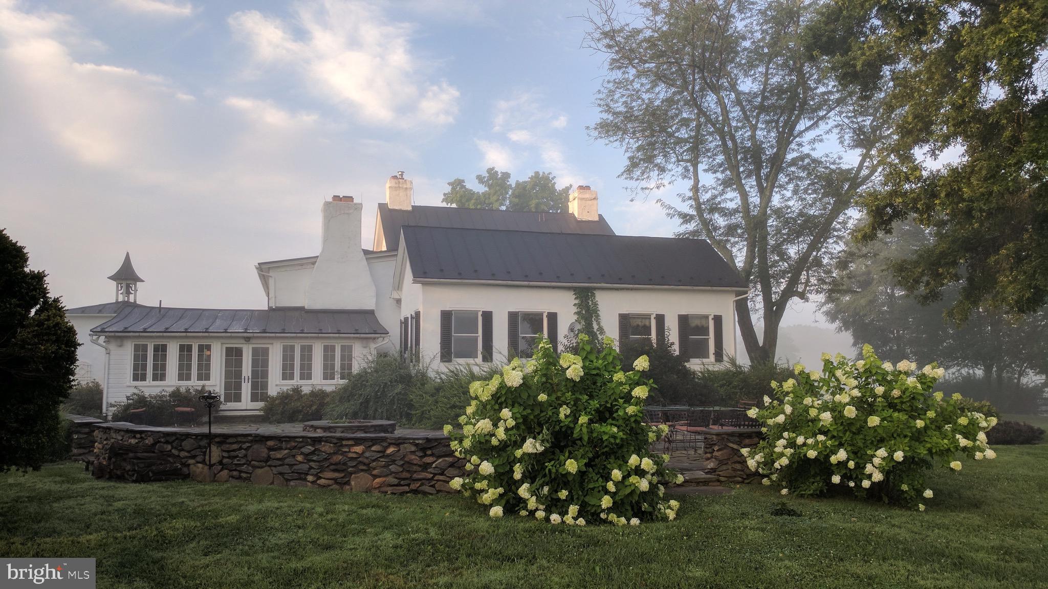 20775 Airmont Road Bluemont, VA 20135 - Photo 5 of 78 Rear view of home across patio