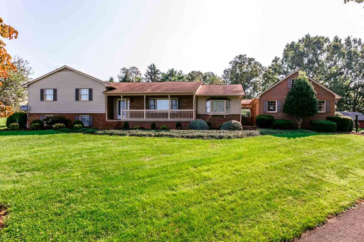 868 Todd Road Mount Sidney, VA 24467 - Photo 1 of 47 a front view of a house with garden