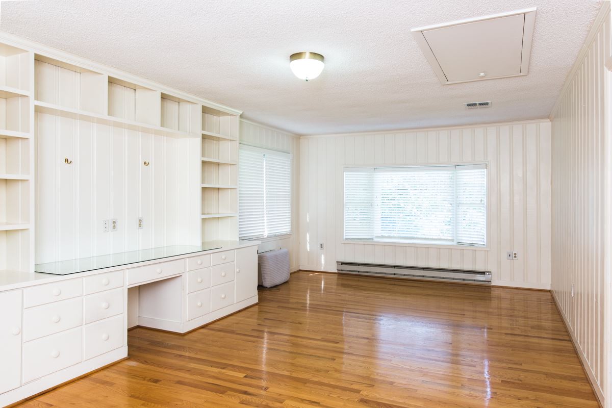 868 Todd Road Mount Sidney, VA 24467 - Photo 4 of 47 a view of an empty room with a window and wooden floor