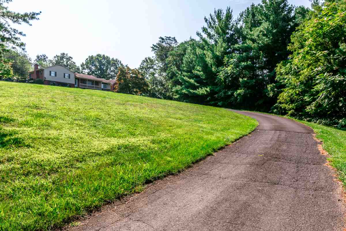 868 Todd Road Mount Sidney, VA 24467 - Photo 45 of 47 a view of a garden with a building in the background