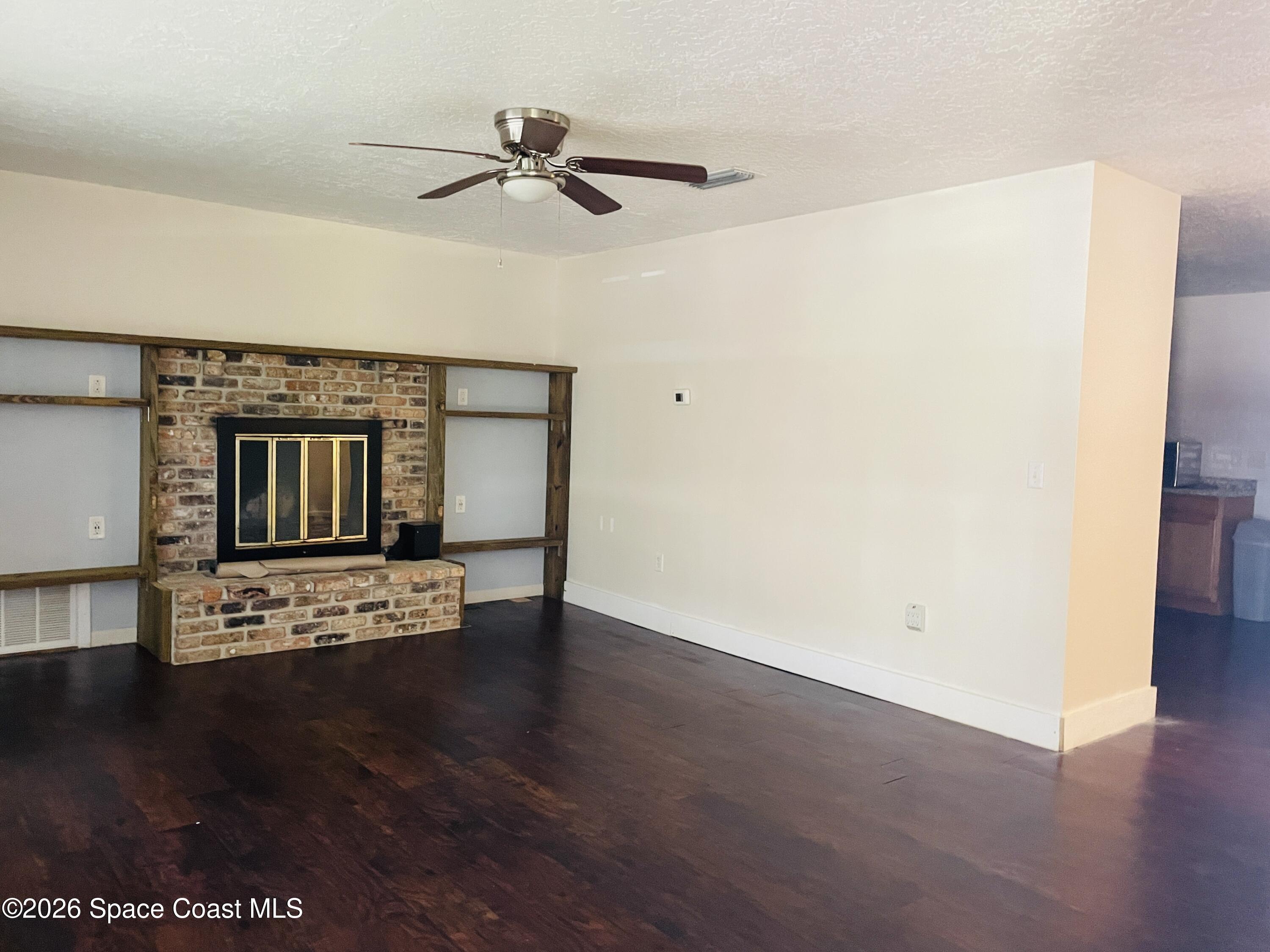 2235 Macedo Road Northeast Palm Bay, FL 32907 - Photo 3 of 20 Family room