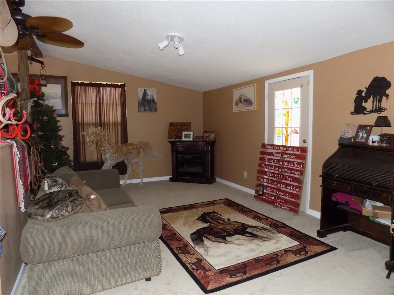 360 County Farm Road Madisonville, TN 37354 - Photo 17 of 32 a living room with furniture and a window