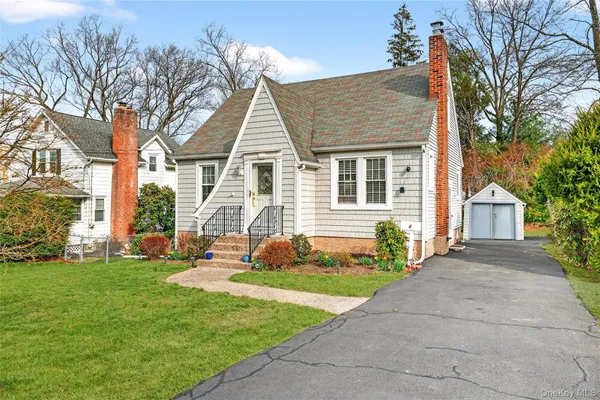 front view of house with a yard