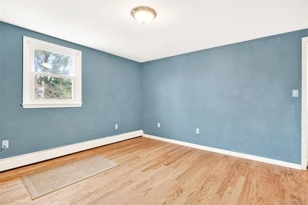 a bedroom with a workspace