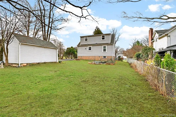a view of backyard with green space