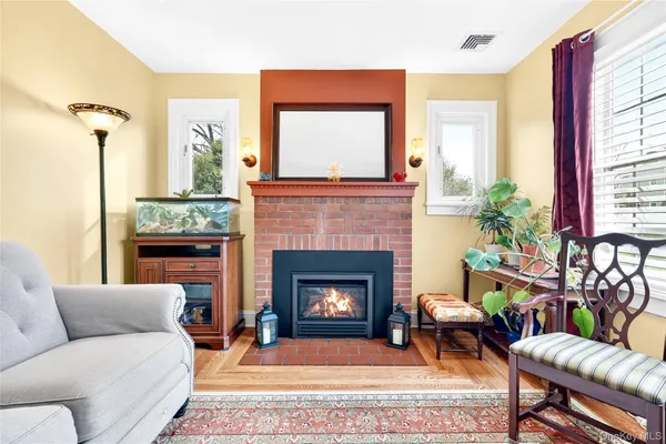 a living room with furniture or fireplace and a flat screen tv