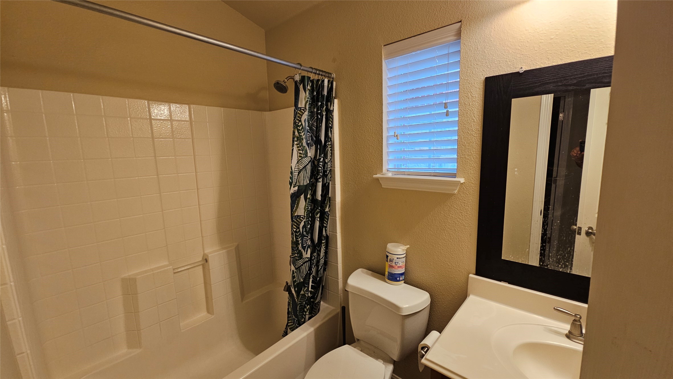 1313 Clary Sage Loop Round Rock, TX 78665 - Photo 14 of 16 a bathroom with a toilet and shower