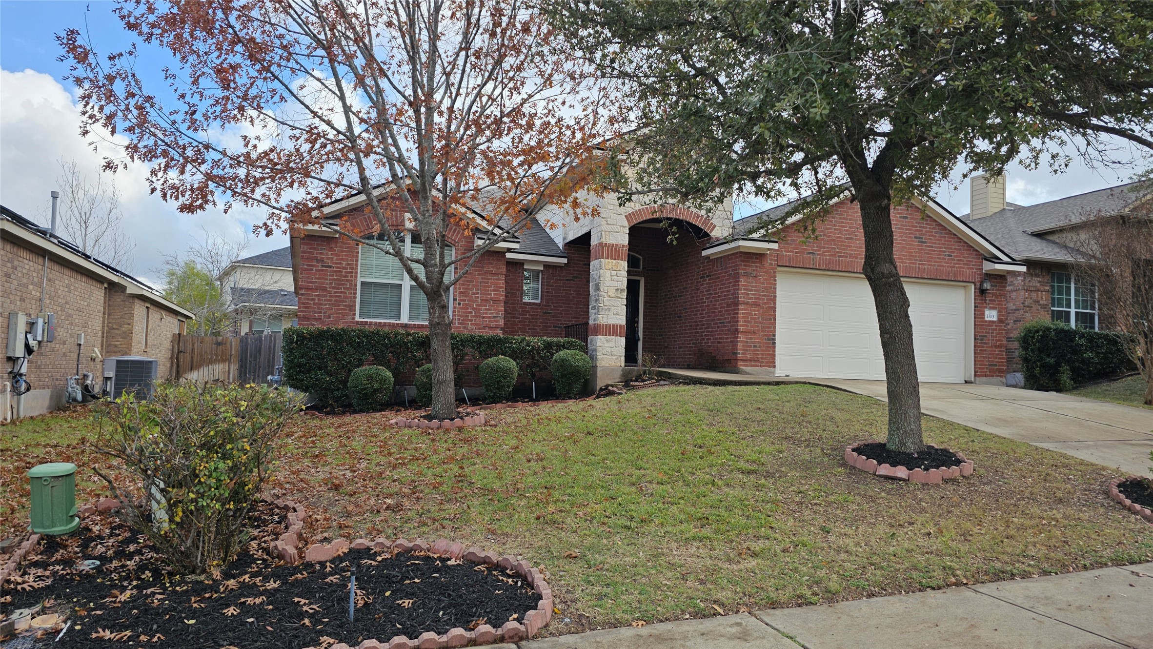 1313 Clary Sage Loop Round Rock, TX 78665 - Photo 2 of 16 a view of a house with a yard