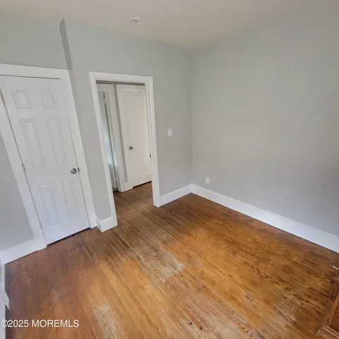 a bathroom with a sink and a shower curtain