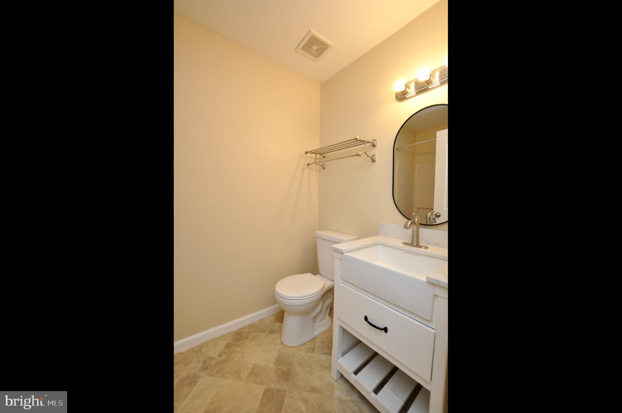 108 Quail Road Marlton, NJ 08053 - Photo 10 of 30 a bathroom with a granite countertop toilet and a sink