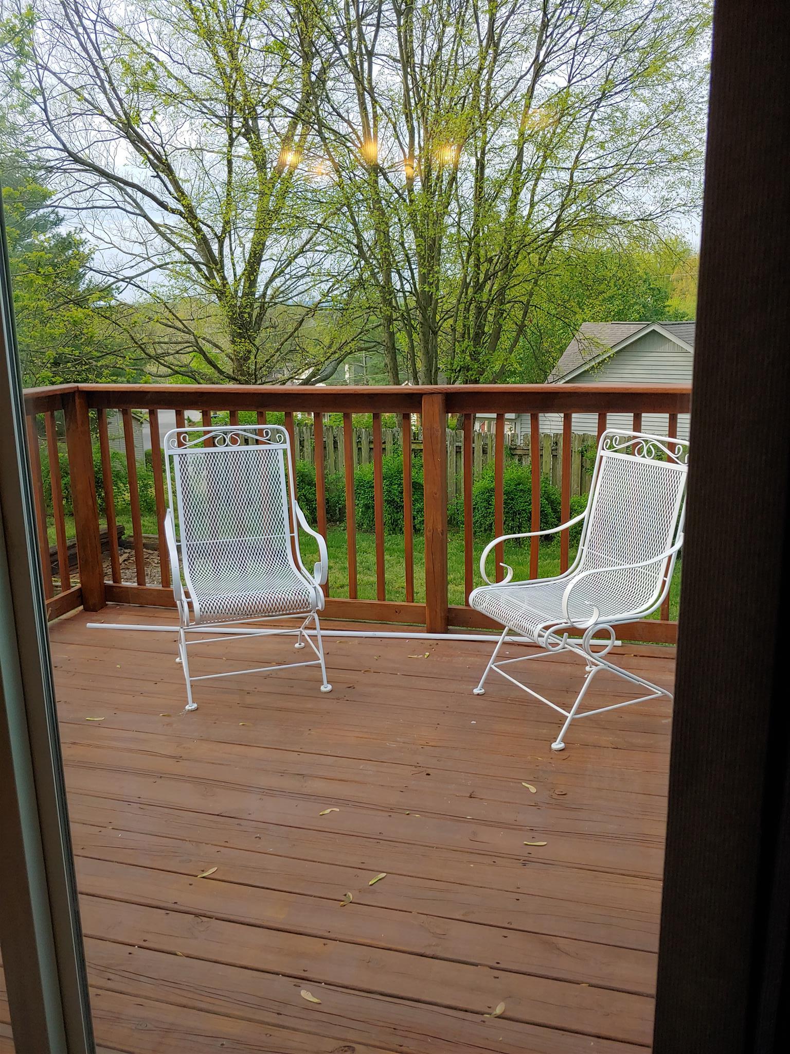 1701 Hunters Branch Road Antioch, TN 37013 - Photo 13 of 17 The roomy kitchen opens out to the spacious deck. Enjoy your coffee in the morning or invite friends and family to your home for a bar-be-que