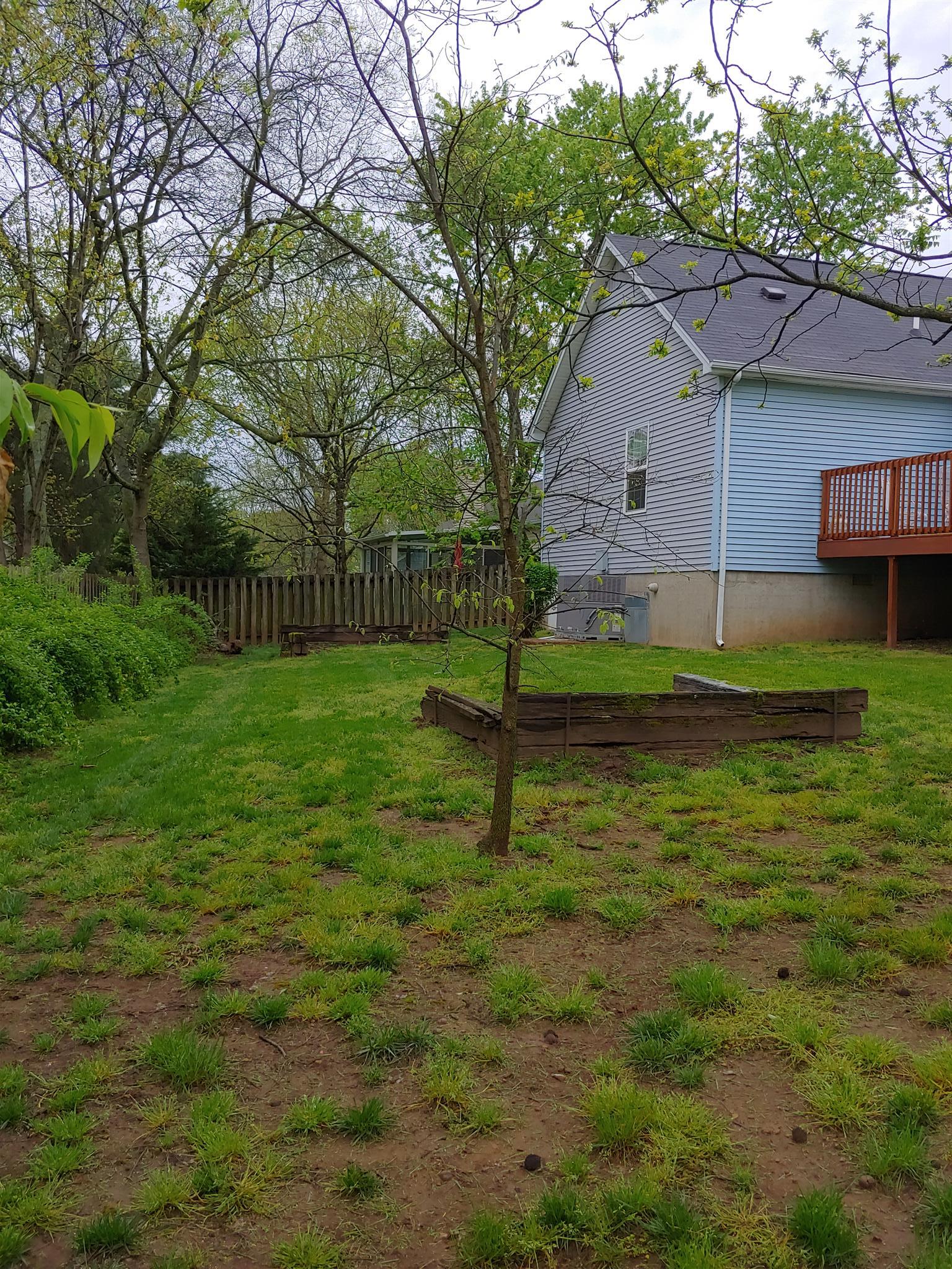1701 Hunters Branch Road Antioch, TN 37013 - Photo 3 of 17 The yard is perfect for enjoying the outdoor activities and the neighbors are welcoming
