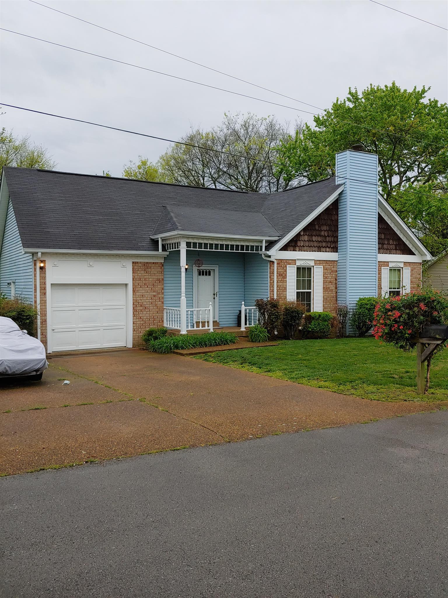 1701 Hunters Branch Road Antioch, TN 37013 - Photo 7 of 17 This home has a one car garage and a wide parking area for guest when you have visitors