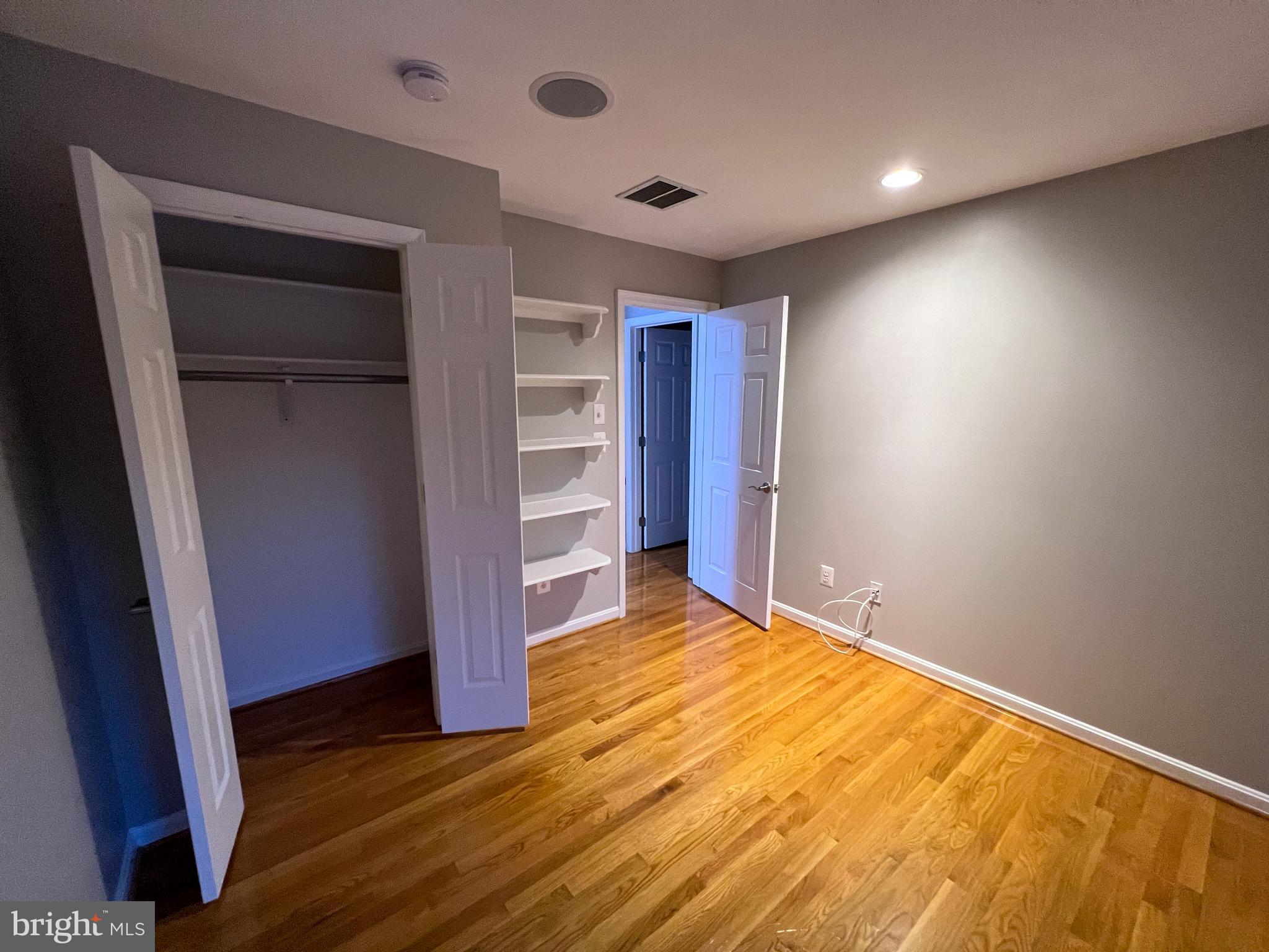 8514 Rhuddlan Road Nottingham, MD 21236 - Photo 13 of 34 a view of empty room with wooden floor