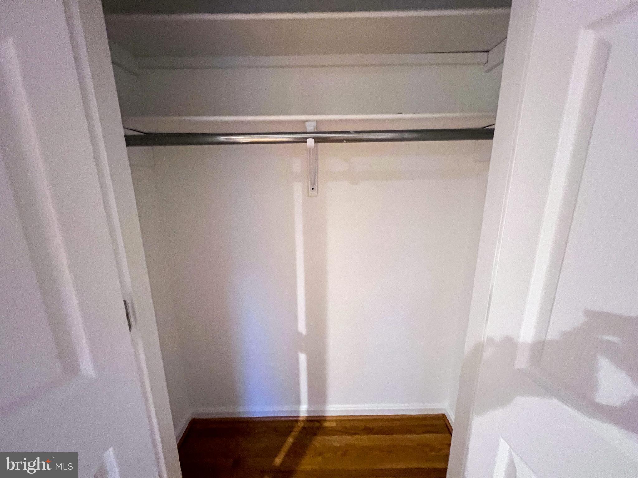 8514 Rhuddlan Road Nottingham, MD 21236 - Photo 14 of 34 a view of small space with racks on the wall