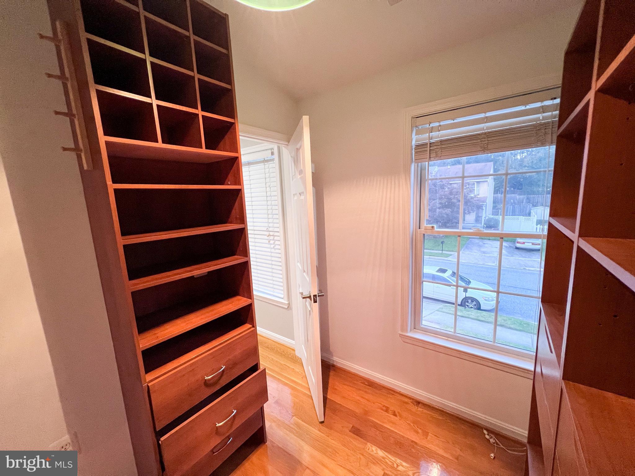 8514 Rhuddlan Road Nottingham, MD 21236 - Photo 23 of 34 a view of walk in closet with empty racks