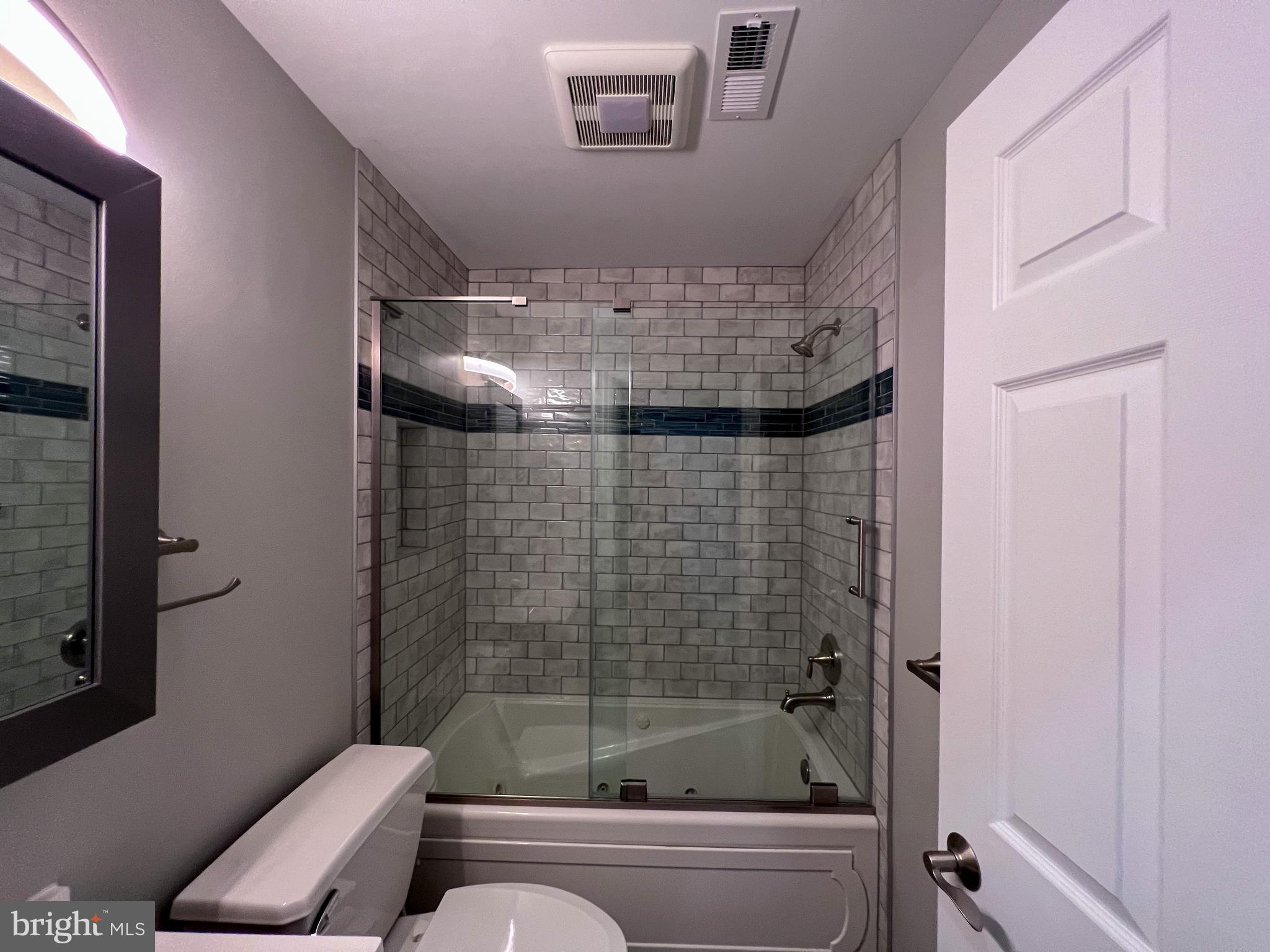 8514 Rhuddlan Road Nottingham, MD 21236 - Photo 31 of 34 a bathroom with a shower and toilet