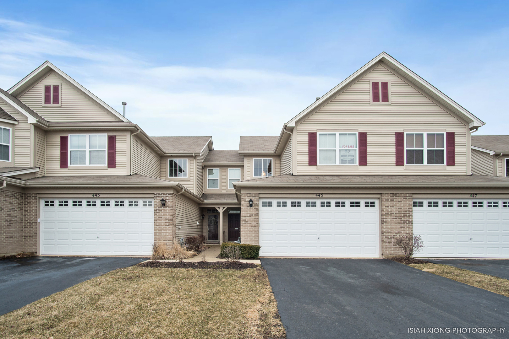 445 Dancer Lane, Unit 405 Oswego, IL 60543 - Photo 1 of 32 a front view of a house with a yard