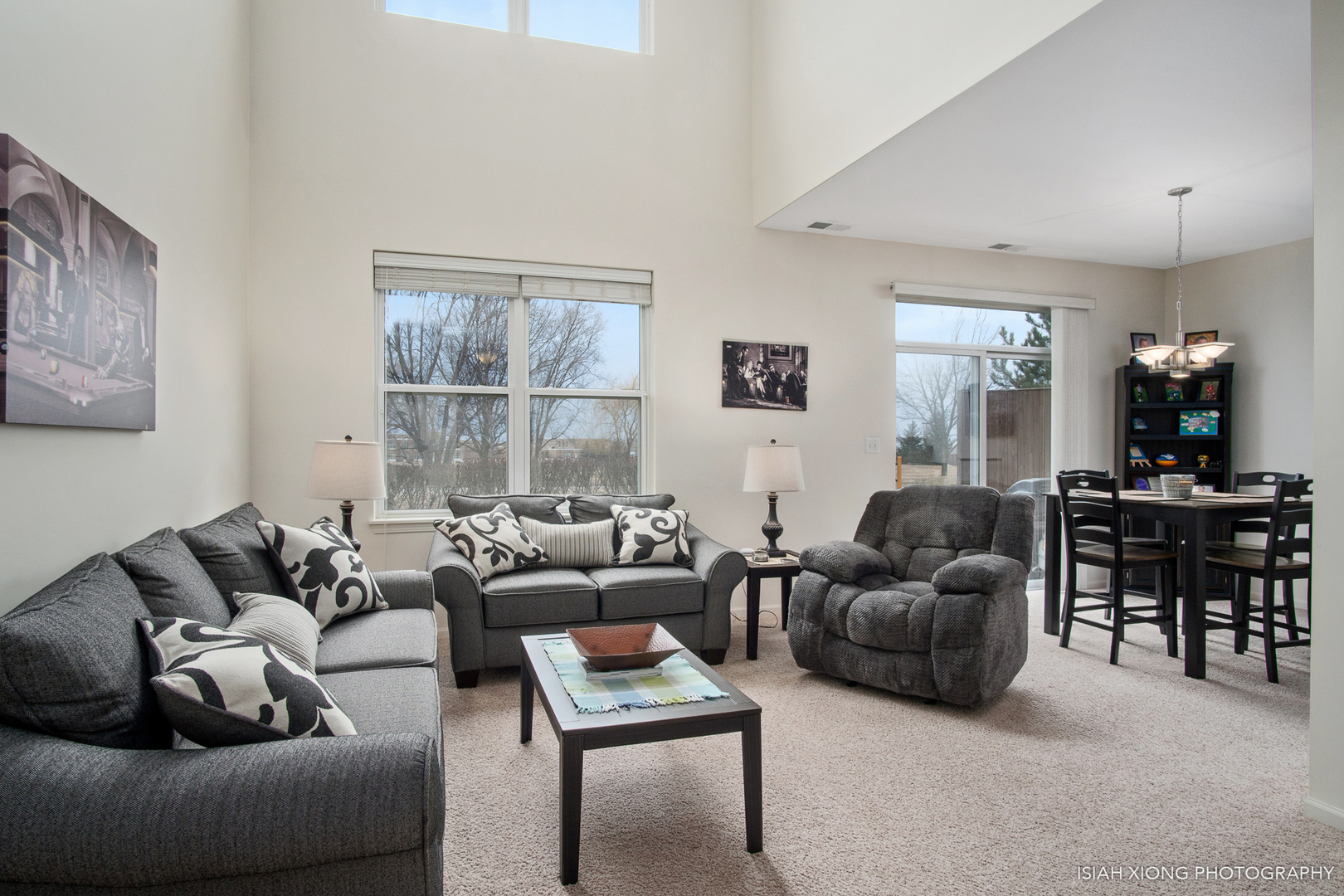445 Dancer Lane, Unit 405 Oswego, IL 60543 - Photo 2 of 32 a living room with furniture and a window