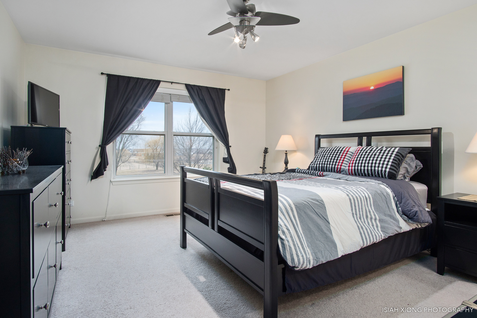 445 Dancer Lane, Unit 405 Oswego, IL 60543 - Photo 11 of 32 a bedroom with a bed and a window