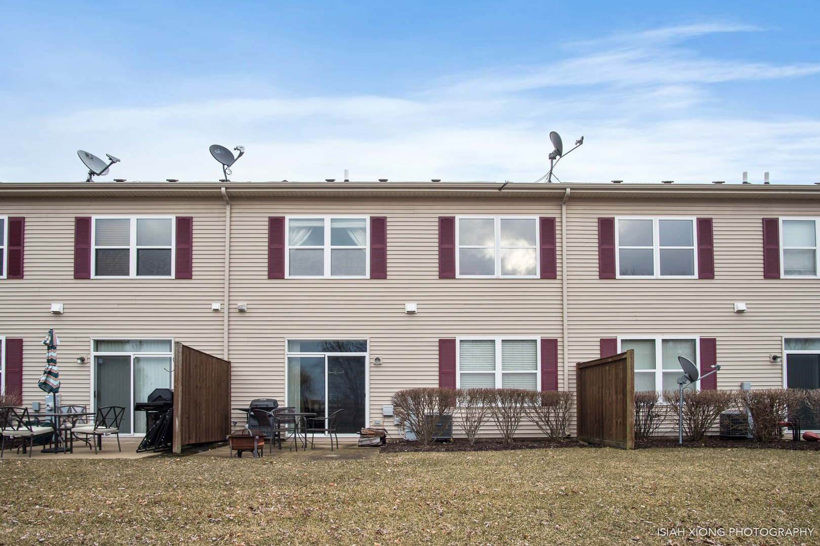 445 Dancer Lane, Unit 405 Oswego, IL 60543 - Photo 15 of 32 a front view of a house with a yard