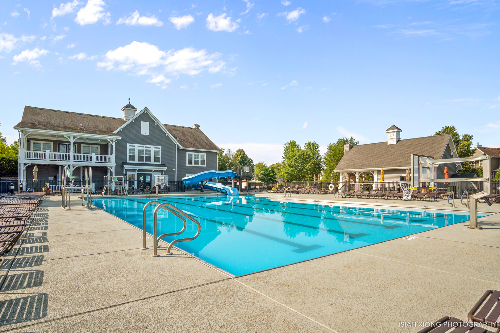 445 Dancer Lane, Unit 405 Oswego, IL 60543 - Photo 18 of 32 a view of a house with a swimming pool