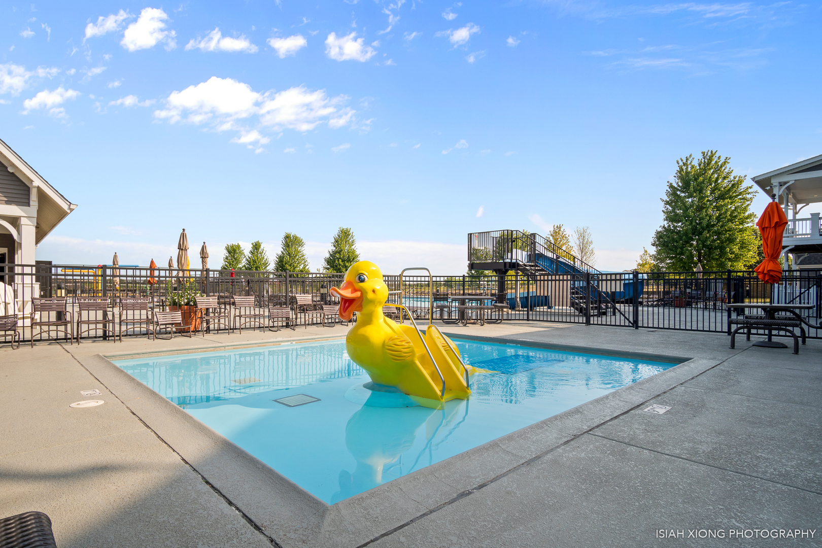 445 Dancer Lane, Unit 405 Oswego, IL 60543 - Photo 21 of 32 a view of a swimming pool with outdoor seating