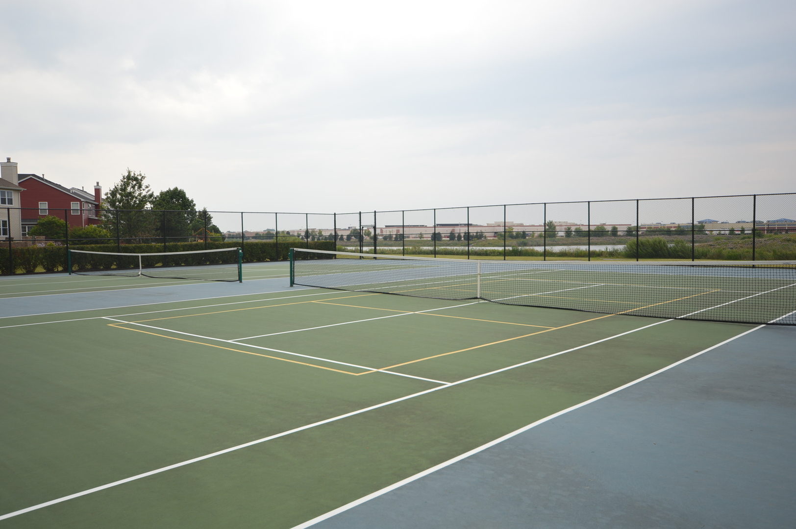 445 Dancer Lane, Unit 405 Oswego, IL 60543 - Photo 29 of 32 a view of tennis court